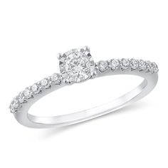 She'll love the classic look of this splendid diamond engagement ring. Fashioned in cool 10K white gold, this choice showcases a 1/5 ct. diamond artfully set to enhance size and sparkle. Additional diamonds shimmer along the shank. Radiant with 3/8 ct. t.w. of diamonds and a bright polished shine, this engagement ring complements her unique style - today and always. Resize Ring, Diamond Engagement Ring Set, Engagement Ring Settings, Diamond Stone, Diamond Engagement Ring, Classic Looks, Ring Sets, Diamond Engagement, Diamond Bracelet