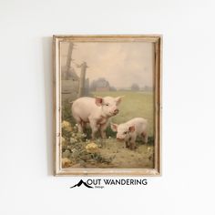 two pigs are standing in the grass next to a fence with flowers on it and one pig is looking at the camera