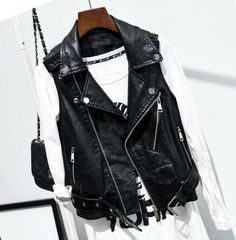 Spring Punk Streetwear Vest, Edgy Streetwear Vest For Spring, Edgy Vest For Biker Events In Fall, Trendy Sleeveless Denim Vest For Winter, Punk Style Vest For Streetwear In Fall, Winter Streetwear Leather Vest, Punk Sleeveless Outerwear For Streetwear, Fall Leather Moto Vest, Punk Style Vest Outerwear For Fall