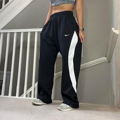 Vintage rare Nike Oversized fit wide leg soft Track Pants tracksuit bottom with popper hem   Tag says XL and sizing is flexible due to drawcord waist, unisex 32" inner leg Seen on size 10uk, 5'4" height With small stain on the side as shown but overall Good condition  joggers sportswear trackie track-pant tracksuit bottom sweatpants casual streetwear baggy pants parachute pants y2k 00s gymwear activewear unisex  68 Nike Womens Sweatpants, Baggy Trousers, Nike Vintage, Baggy Pants, Baggy Pant, Casual Streetwear, Gym Wear, Womens Sweatpants, Vintage Nike