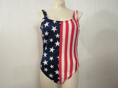 "Vintage 1980s American flag swimsuit or bathing suit. Made of red, white and blue Lycra/Nylon. Most likely a Speedo, but has no label. Size large. Measures: 28\" around the waist 31\" around the hips 29\" overall length In excellent unused condition." American Flag Swimsuit, Vintage Swimsuit, Stars And Stripes, Red White And Blue, Women Swimsuits, Womens Swimwear, Bathing Suit, Tankini, Vintage Clothing