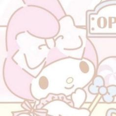 an image of a hello kitty holding a teddy bear