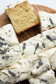 slices of lavender cake on a wooden plate