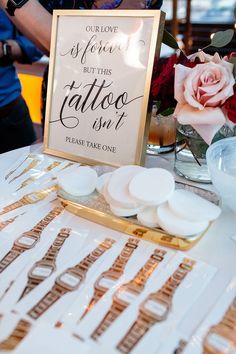 a table topped with lots of white plates