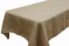 an image of a linen tablecloth on a white background with no people around it