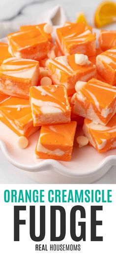 orange creamsice fudge on a white plate