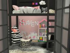 there is a bunk bed in the children's room with pink and black decor