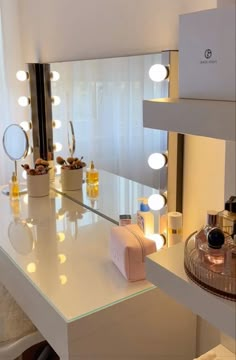 a vanity with lights on it in a room