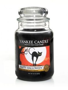 yankee candle with an image of a black cat on it