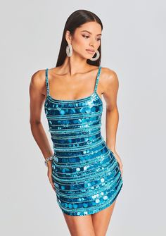 Stop the show in our Monae Dress. This stunning blue mini dress features rows of blue paillette sequins contrasted by rhinestones, crystals, and beads for a dazzling display of texture. It's complete with low back and hidden center back zipper. Shown here in Aqua Blue. 100% Nylon Made in India Model is 5'10" wearing size XS Style No. SS23-6512 Semi Dresses, Australia Clothes, Sparkly Mini Dress, Blue Sequin Dress, Disco Dress, Sparkly Dress, Blue Mini Dress, Looks Chic, Hoco Dresses