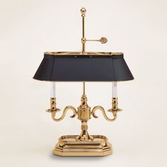 a table lamp with a black shade on it