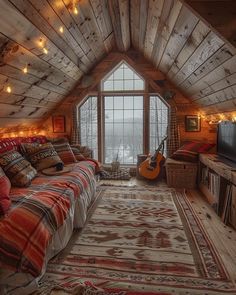 a living room filled with furniture and a large window covered in string lights next to a flat screen tv on top of a wooden wall