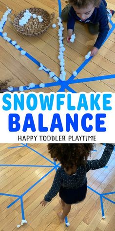 a child playing with snowflake balance on the floor