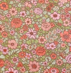 an image of a flowery background with pink and green flowers on the side,