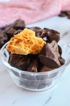 a glass bowl filled with chocolate covered waffles