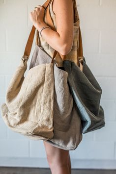 Oversized linen totes are perfect for any adventure. Designed with thoughtful details and a wonderful soft touch, these totes are ideal for outings to the farmers market, running errands and grab bags for outdoor activities. Made with a soft leather strap, jute outer covering, and cotton lining, these totes are durable, simple and chic! Cotton Tote Bags Design, Linen Accessories, Linen Tote Bag, Bag Craft, Aesthetic Bags, Farmers Market Bag, Oversized Tote Bag, Diy Tote Bag, Oversized Tote