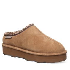 If you like a slip on with great support and durability both indoors and outdoors, these classic suede slippers will not disappoint. Whether youre taking a late-night store run or reading a book in your favorite chair, these slippers will hug your feet and keep them perfectly warm with their wool blend lining. | Bearpaw Women's Martis Platform Slipper, 11M Indoor Outdoor Slippers, Clog Slippers, Outdoor Slippers, Suede Slippers, Reading A Book, Platform Slippers, Casual Slippers, Bearpaw Boots, Soft Suede