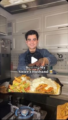 a man standing in front of a counter with food on it and the words heating my sister's husband