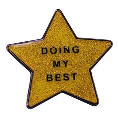 a gold star with the words doing my best written on it