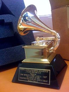 an award trophy sitting on top of a desk