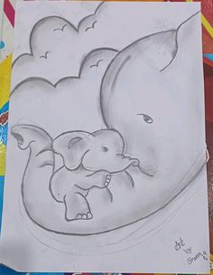 a drawing of an elephant and its baby is shown in this image with colored pencils