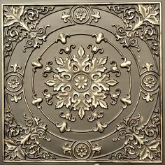 an intricately designed ceiling tile with ornate designs