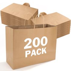 a brown paper bag with the words 200 pack in white letters on it, sitting next to stacks of brown paper bags