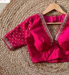 Hand embroidered ready made saree blouse / crop top/stitched saree blouse usa /  hot pink saree blouse/ hand embroidered blouse/zardosi blouse/purple saree blouse/ pure silk blouse/ maggam work blouse        It is very true that a perfect blouse is the one which makes your saree look stand out !! If you find one of such a style that you have been wanting to have then dont let it go !! we carry such unique trending blouses that instantly add a stylish look to any saree !!     Well..!! we understa Pink Gold Blouse Designs, Simple Georgette Blouse Designs, Dark Pink Blouse Designs, Silk Pink Blouse With Mirror Work, Pink Silk Blouse With Mirror Work, Anarkali Pink Blouse With Mirror Work, Fitted Raw Silk Tops With Mirror Work, Pink Raw Silk Blouse For Party, Fitted Raw Silk Top With Mirror Work