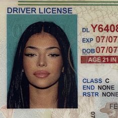 a driver's id card with an image of a woman