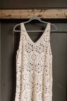 Get into "beach vacation mode" with our laid back Boho Sleeveless Casual Crochet Cover-Up Tunic Top. Perfect for lounging on the sand or strolling the boardwalk, this top will keep you comfortable and stylish all day long. True to size V-neck Cover-Up tunic top Crochet Scalloped Edging Colors: Beige Fabric: 65% Cotton / 35% Polyester Brand: Adora Have questions or need help deciding on fit? Want styling advice? Message us on our FB page here! We'd love to help you! Summer Sleeveless Tank Top For Beach, Summer Sleeveless Vacation Tank Top, Summer Crochet Trim Beachwear Tops, Summer Crochet Beachwear Tops, Crochet Lace Summer Beach Tops, Crochet Lace Tops For Summer Beach, Crochet Lace Tops For Summer Vacation, Summer Tops With Crochet Lace For Beach Season, Summer Vacation Tops With Crochet Lace