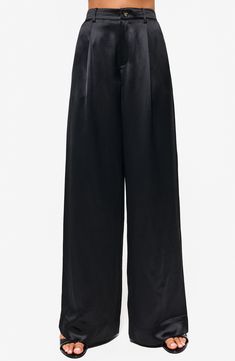 A luxurious sheen amplifies the rich look of these silky satin pants showcasing sweeping wide legs and a fitted high waist. 31 1/2" inseam (size 4) Zip fly with button closure 73% acetate, 27% polyester Dry clean Imported Pants Nordstrom, Cami Nyc, Satin Pants, Wide Legs, Black Fits, Modest Dresses, High Waist, Wide Leg, Dry Clean