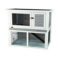 a white rabbit hutch with two doors and one door open