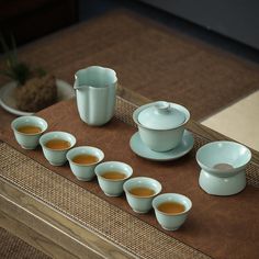 The High-End Ru Ware Porcelain Tea Set showcases the noble and unique beauty of Ru porcelain. The tea set is made from carefully selected Ru kiln porcelain, with a glazed surface that presents a distinctive sky blue color and unique crackling patterns, showcasing its rustic and elegant characteristics. Unique tea set, pretty tea cup, tea time, tea gift ideas, elegant tea sets, perfect gift for tea lovers, gifts for her Tea aesthetic, tea party ideas, tea drinking Art Of Tea, Sky Blue Color, Porcelain Tea Set