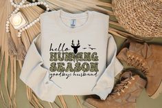 Hello Hunting Season Goodbye Husband Sweatshirt, Hunting Wife Tshirt, Hunting Season Hoodie, Hunting Lover Gift, Camo Shirt, Wife Gift Hello there! We choose one of these brands depending on our stock status: Bella Canvas, Gildan Softstyle, Outlash, and Circle. If you have a preferred brand, please mention it in the personalization section so we can prepare your order accordingly. Here's some additional information: * Solid color t-shirts are made of 100% cotton. * Heather color t-shirts are made from a poly-cotton blend. * Hoodies and sweatshirts (only Gildan) are made of 50% cotton and 50% poly. * Unisex sizing. * Modern classic fit. * Taped neck and shoulders. Reading the Sizing Chart: Review all size charts that are included with the product pictures. Please note that the size charts p Wife Tshirts, Camo Shirt, Camo Shirts, Hunting Season, Hoodies And Sweatshirts, Wife Gift, Hello There, Choose One, Dallas Tx