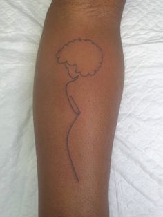 a person with a tattoo on their leg