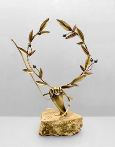 Greek Bronze Olive leaf Wreath on glass Greek Olympic Games, Archery Medal, Ancient Greek Olympic Games, Greek Furniture, Olive Wreath, Greek Symbol, Wreath Illustration, Symbol Of Peace, Greek Mythology Art