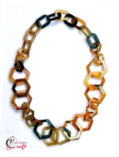 "Horn necklace chain have natural colour, made without any chemicals, only polished. Lightweight. The size of the necklace chain : 39.37 \" ( 100 cm) length A bout me I was born from traditional villages producing handicrafts from the material: mother of pearl, horn, bone, sea snails .... With over 400 years of history, passion and desire to bring natural beauty to the world, I have worked relentlessly to create products with the best quality. Here you can find a part of nature. If you have a Pr Marion Hamilton Necklaces, Sea Snails, Sea Snail, Horn Necklace, Necklace Chain, To The World, Chains Necklace, Horn, Mother Of Pearl