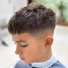 Short little boy haircuts. Looking for some fresh ideas for boys haircuts? Take a look at our list of the 55+ best haircuts for boys to get right now. You will find fade haircuts, short haircuts, medium to longer length haircuts for boys, cute hairstyles, and new ideas for naturally curly or thick hair. Check them out now! #boyshair #boyshaircuts #haircutsforboys #hairstylesforboys #boyshairstyles #newboyshaircuts #cuteboyhaircuts #fadehaircutsforboys #boysfadehaircuts Jj Haircut, Fade Haircut Boys, Faded Mohawk Boys, Boys Summer Haircut, Teen Boys Haircut Trendy, Toddler Fade Haircut, Short Boys Haircut Trendy, Boys Short Haircut