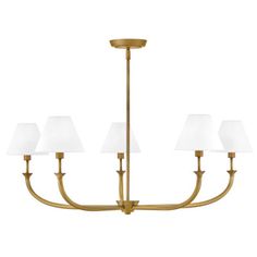 a large brass chandelier with white shades on the bottom and four lamps hanging from it