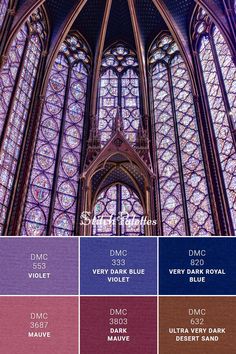 the inside of a large cathedral with many windows and stained glass in different colors on it