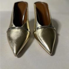 Brand New Beautiful Golden Shoes. All Leather, Hand Made In Italy. European Size 41, Equivalent To Us 10.5. Purchased In Nordstrom Rack By My Husband, But Unfortunately, 4” Heels Are Too High For Me. No Box Designer Mules With Pointed Toe And Reinforced Heel, Luxury Gold Slip-on Heels, Chic Evening Slip-on Court Shoes, Designer Pointed Toe Mules With 4-inch Heel, Pointed Toe Heels For Galas, Party Calf Leather Pointed Toe Mules, Pointed Toe Calf Leather Mules For Party, Pointed Toe Calf Leather Party Mules, Gold Medium Width Slip-on Heels