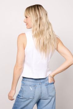 Round out your denim collection with this so-chic denim vest by EVEREVE. Finished in a bright white wash, this fitted silhouette features a front button closure and seam details for a tailored feel. Style with jeans or cargo pants for a day-to-night look. | EVEREVE Women's Sierra Denim Vest, Size Large, White Light Wash Button-up Denim Vest, Summer Light Wash Button-up Denim Vest, Summer Button-up Washed Blue Denim Vest, Trendy Medium Wash Button-up Denim Vest, Denim Blue V-neck Denim Vest, Denim Chic, Brand Style Guide, Vest White, Fashion 101