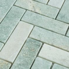 an image of a tile floor that looks like it is made out of marble blocks