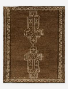 a brown rug with an intricate design on the bottom and sides, in two rows