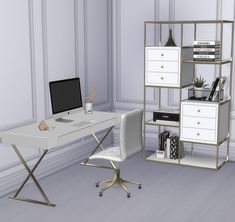 a computer desk sitting next to a white chair and book shelf on top of a hard wood floor