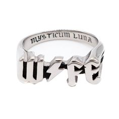 a silver ring with the word, mystirium lunaa on it's side