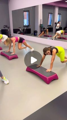 a group of people doing exercises on exercise mats