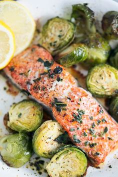 salmon and brussel sprouts on a plate