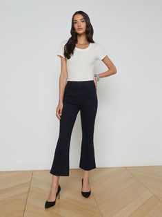 An effortless pull-on jean in super soft stretch denim and a cropped length, now in an ultra dark indigo wash. • Soft stretch denim• High-rise cropped micro bootcut• Center front seaming• Elasticized waistband• No closures | L'AGENCE Kayden Pull-On Kick Flare Pants In Metro Kick Flare Pants, Lace Coat, Flare Pant, Knit Denim, Pull On Jeans, Kick Flares, Dark Indigo, Denim Coat, Bottom Clothes