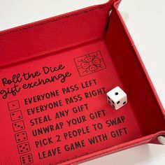 a red box with dices and instructions on it